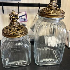 Elegant Glass Jars with Ornate Gold Lids